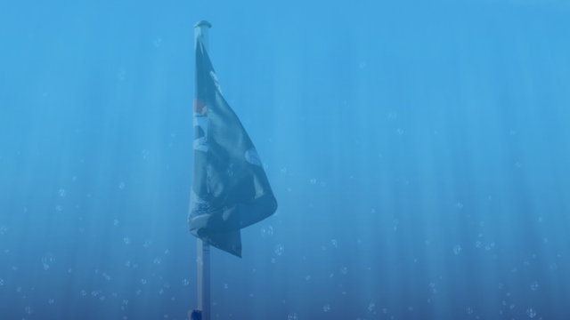 Piratenfahne versinkt im Wasser