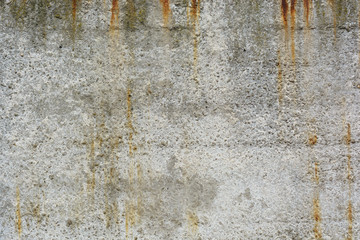 Concrete wall with rust stains