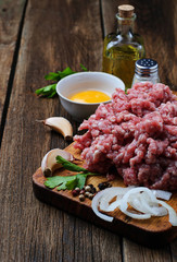 Raw minced meat with olive oil and garlic