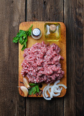 Raw minced meat with olive oil and garlic