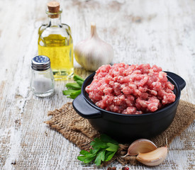 Raw minced meat with olive oil and garlic