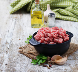 Raw minced meat with olive oil and garlic
