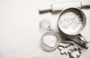  Ingredients for dough - sieve flour, rolling pin, cookie cutters.