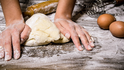 Preparation of the dough. Preparation of the dough the women's hands.