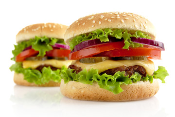 Big cheeseburgers isolated on white background