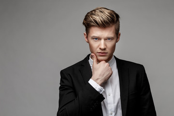 Portrait of a young handsome business man.