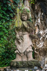 Fototapeta na wymiar Good man sculpture Am Phu Cave Danang