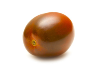 One red tomato on white background