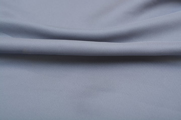 Shiny elegant silver satin silk fabric background