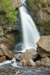 waterfalls in rocky mountain landscape