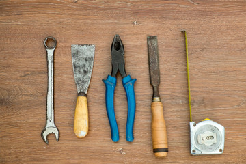 different old tools on wood
