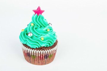 Seasonal festive Christmas mini dessert cupcakes in traditional decorative symbols elements.