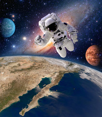 Astronaut spaceman solar system planet spacewalk earth outer space walk galaxy. Elements of this image furnished by NASA.