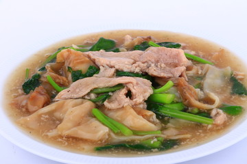 The Best Thai Dishes, Wide Rice Noodles Pork in Thick Gravy, Thai Noodles Topped with Pork: Chinese and Thai Style food called 