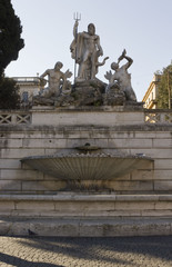 Fototapeta na wymiar Close up of the Fountain of Neptune in Piazza del Popolo in Rome, Italy, with nobody around