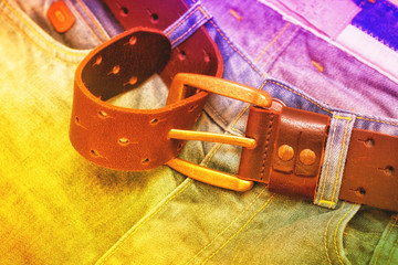 jeans and leather belt with a buckle, background and texture jeans, Bright colors artistic design