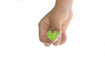 Hand holding a heart shaped plant
