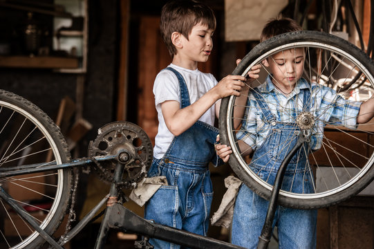 Children mechanics, bicycle repair