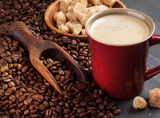 Coffee cup, beans and brown sugar