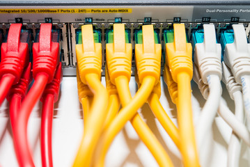 Patching cords connected to switch close up