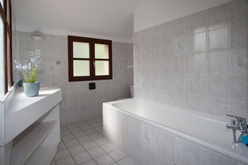 Fototapeta na wymiar White clean and modern minimal bathroom in a house