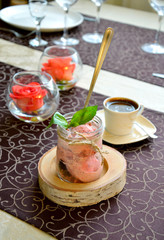 Ice cream with strawberry and a basil