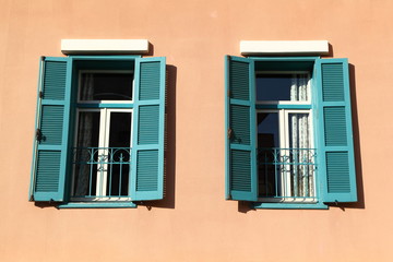 Fototapeta na wymiar Beirut Architectural Detail: Green Shutter Windows
