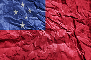 Samoa flag painted on crumpled paper background