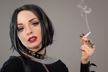 Obraz premium Woman with cigarettes / Punk woman smoker with six cigarettes