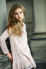 Beautiful young girl in dress posing in Firenze, Italy