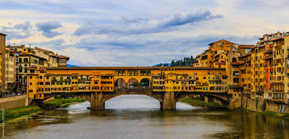 Wall mural beautiful sunset view of bridge ponte vecchio, florence, italy