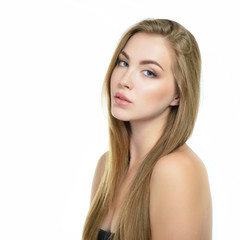 Fototapeta premium Beauty portrait of young woman with beautiful face and long heal