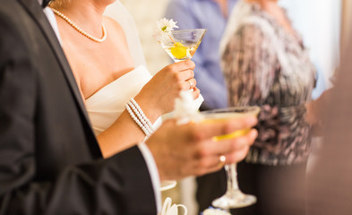 Guests drink champagne on the wedding ceremony