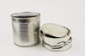 a pair of crumpled cans

