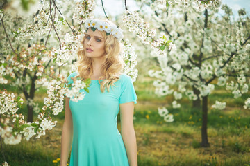 Blond nymph wearing a white wreath