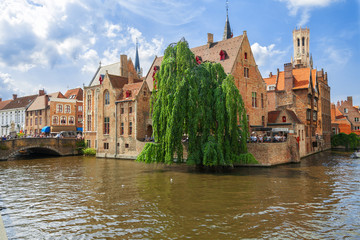 Fototapeta premium Dock of the Rosary (Rozenhoedkaai) and Belfry. A scene from a medieval fairytale in Bruges, Belgium