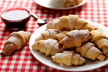 Fresh homemade croissants on a red napkin
