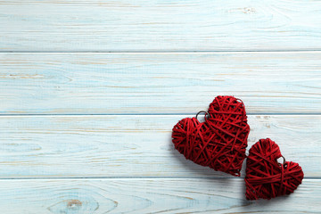 Love hearts on a blue wooden background