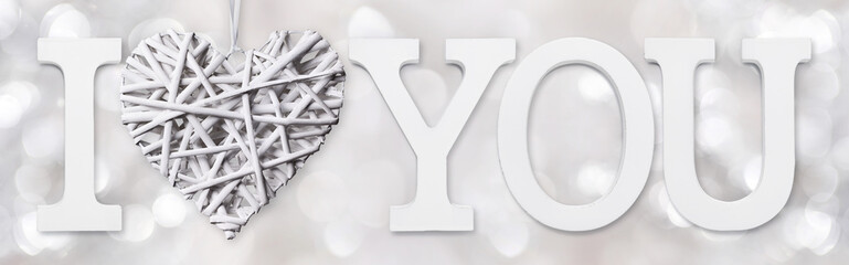 i love you text with heart of woven wood