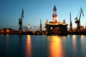 Night view of the drilling platform standing in the yard during renovation