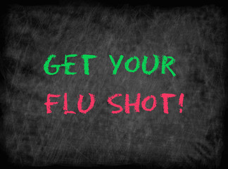 Obraz premium Get your flu shot! - text on chalkboard
