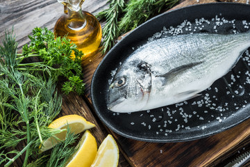 Fresh sea fish in frying pan