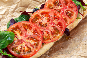 Vegetarian ciabatta, sandwich with vegetables. close up