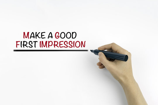 Hand with marker writing: Make a Good First Impression