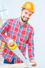 Pleasant man   working with wood 