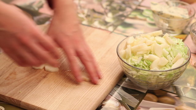 vegetable salad preparation pear and cabbage