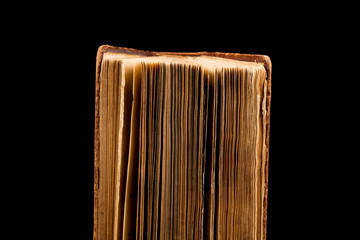 ancient book shot on black background