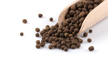 Wooden shovel with black peppercorn