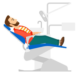 Patient in dental chair.
