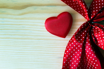 valentine heart with red dotted ribbon